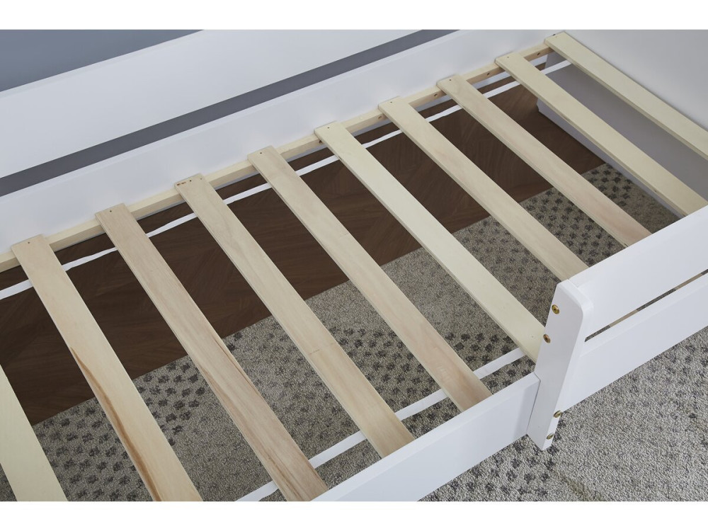 Children's bed with barrier...