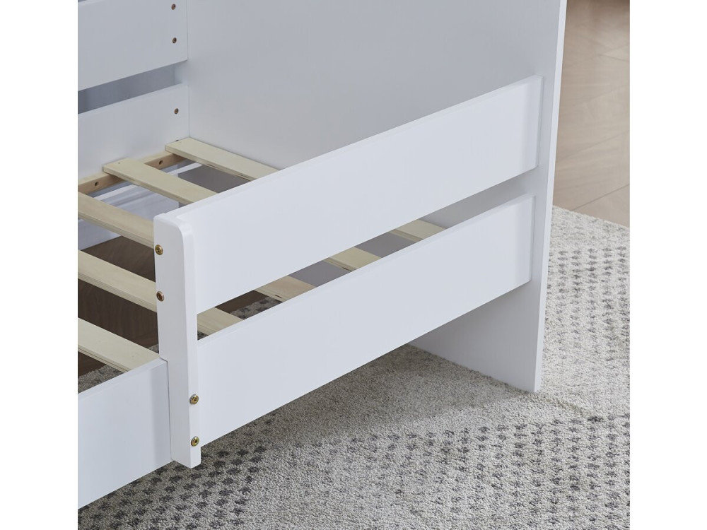 Children's bed with barrier...